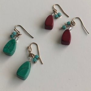 Two pair of turquoise colored earrings
